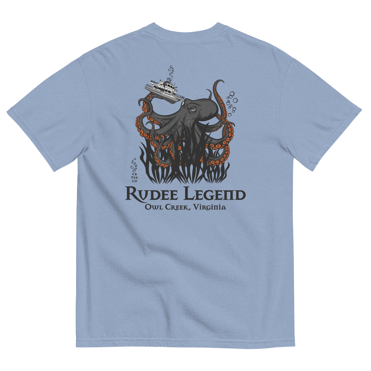 Back of light blue heavyweight cotton t-shirt featuring giant octopus holding boat with "Rudee Legend Owl Creek, Virginia" text.